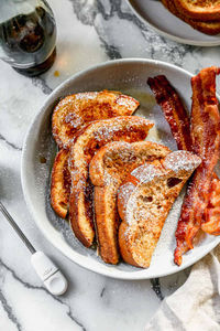 This easy French Toast recipe is the BEST, with a thicker batter and cinnamon sugar flavors that really set it apart. It's one of our family's favorite breakfasts!