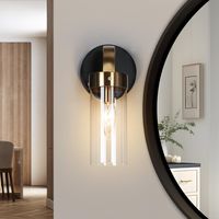 The wall sconces combine modern and vintage styles. Black metal holder, brass curved arm, and clear cylindrical glass shade showcase a modern minimalist look. Classic design and simple style will create a warm and cozy atmosphere.