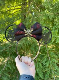 Ready to have the most magical day at the Happiest Place on Earth? These park mouse ears are perfect for any day in the parks. Each set of park mouse ears are made individually and printed using PLA filament.  Because these are 3d printed, there may be slight imperfections, may contain ridges, and sometimes thread like webbing, or slight variations from the photo.  Each pair is designed to last all day in the park however, they are not suited for high heat temperatures. Leaving these ears out in the sun or in your car will cause them and the glue to melt or distort.  Headbands are lightweight, non-slip and one size fits most toddlers to adult. Any alterations to the headband after receiving the product will change the sizing of the headband and cause the ears to break.  Tattered look of bo