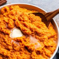 Perfectly smooth mashed sweet potatoes loaded with butter, honey, and cinnamon are an easy side dish that's always a crowd favorite.