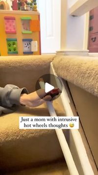 Jordan on Instagram: "@hotwheelsofficial thoughts to entertain my crazy 3yr old boy! Shout out to my husband for being onboard and making it happen haha One of these days I want to redo our stairs… but for now it’s a hot wheels launch ramp 🚀 🏎️ 😅 #momlife #hotwheels #sahm #dadlife #parenting"