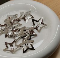 not sure where to get these but star hair clips ! silver ones cuz i like silver