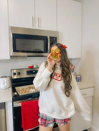 baking gingerbread cookies in the kitchen christmas holiday aesthetic picture inspo