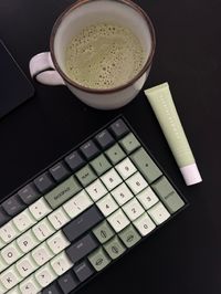 Elevate your work setup with this aesthetic mechanical keyboard adorned with soothing matcha-colored keycaps. Pair it with a warm matcha in a cute mug and a matcha green lip balm for the ultimate blend of style and focus. 🍃💻 #ProductivityVibes #AestheticTech #MatchaMoments