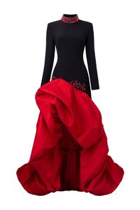 High neckline, long sleeves black scuba top body with draped red taffeta hem. - Mermaid shape- Fully-lined- Invisible zipper down the side- Made in Vietnam Composition: Crepe: 100% PolyesterTaffeta: 64.8% Polyester, 29.2% Polyamide, 6% SpandexShoulder to Hemline: 156cm Model wears size XS