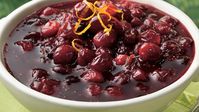 Brown sugar and orange juice balance the tartness of cranberries in a four-ingredient homemade sauce.