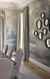 We created a custom colorway for this dining room designed by our client Hannon Douglas. These landscape murals are hand-painted by me; Then they get photographed, customized for each client's project, and printed onto museum-quality wallpaper by my creative team. Even I can't tell the difference between my original murals and my printed wallpapers! - Susan Harter