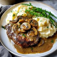 Bobby Flay’s Salisbury Steak Recipe with Mushroom Gravy