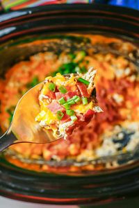 Crock pot crack chicken is a flavorful creamy chicken mixture with cheese, bacon and green onions on top for an addictively delicious meal. And it’s only 6 ingredients and 5 minutes to prep!