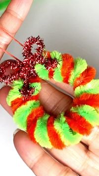 DIY Christmas Wreath Ornament made from pipe cleaners. This delightful craft project offers a fantastic way to infuse your home with the spirit of the season while engaging in a creative and enjoyable activity. Thank you for watching . Craft Supplies, Materials & Tools **Contains affiliate links** #https://amzn.to/46t8FBe #https://amzn.to/46rhVFO #amazonfinds #amazonbestbuys