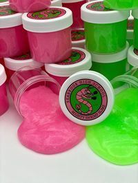 "Z-O-M-B-I-E-S everywhere are FIRED UP about our new Fighting Shrimp Slime! These amazing neon green and bright pink slimes come in a 2oz airtight container with a 2\" glossy label featuring the Seabrook High School Mighty Shrimp! Each Party Pack contains: ~6 individual 2oz slimes ~6 Custom glossy labels ~Your choice of Seabrook's favorite scent! At Tini Slime we pay BIG attention to all the TINI details! All Tini Slime's come packaged gift ready with festive labels. PLEASE TELL US YOUR CHILDS P