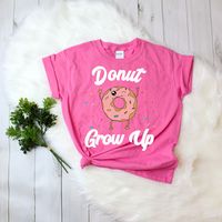 Donut grow up! This cute design is the perfect outfit for any kids that you just want to stop from growing up too fast! Features a cute, Kawaii donut illustration with its arms in the air with rainbow sprinkles all around. Great for a donut themed birthday party, event, or as a stocking stuffer for your little one! Great to wear as matching outfits for a photo op. You can also find more birthday, holiday, Christmas, and other unique shirts in our store: https://www.etsy.com/shop/zjthreads Have a