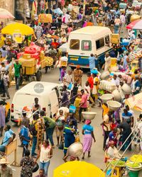 Photos from Makola, the largest market place in the center of Accra, the capital of Ghana 🇬🇭.   The market was constructed in Accra in 1924 and stood at the heart of the city. It is the main wholesale and retail marketplace in Accra, the epicenter of trade in the country    A wide variety of products is sold at Makola and its surrounding streets. It’s dominated by women traders, selling wide varieties of products like fresh produce, manufactured and imported foods, clothes, shoes, tools, medicines, pots and pans.  Handcrafted beads and jewelry can also be found for sale in the market. All type of school materials such as uniforms, pens books and stationery can also be found at Makola.   📍Makola Market, Accra 🇬🇭  #ghana #makolamarket #accra #visitghana #ishootghana #streetphotography