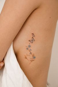 Elevate your ink game with these small rib tattoos for women, boasting simplicity and style! Discover minimalist charm with these sleek designs that offer endless possibilities for self-expression. Whether you're into subtle symbols or delicate linework, find your perfect rib tattoo idea here.#SmallRibTattoos #SimpleInk #WomenWithTattoos #MinimalistTattoos #InkIdeas #RibTattooInspiration #TinyTattoos #ChicInk #SubtleBeauty #TattooInspo