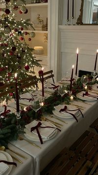 a burgundy christmas table setting inspo #christmasdecor #burgundy #bows #christmastablescape #christmastablesetting #christmastabledecor #christmastabledecorations #christmastheme