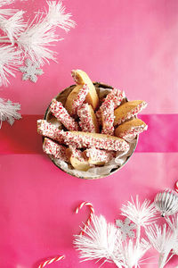 Dress up your biscotti for Christmas with a chocolate dip and candy-cane garnish.