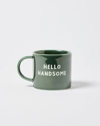 Start the day right with this green ceramic mug. In a classic profile, it's finished with a shiny green glaze and 'hello handsome' text.