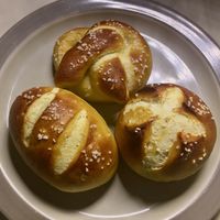 Homemade sourdough pretzels are easy to make...soft and chewy with just a hint of sourdough tang. Shape them into the traditional twists, or as hamburger buns & sandwich rolls. They're a great way to use unfed sourdough starter!Adapted from King Arthur Flour