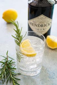 Light and refreshing herbal take on the traditional Gin Fizz, this Rosemary Gin Fizz combines the flavors of rosemary and lemon, is only 5 ingredients and egg-free. #cocktails #happyhour #gin