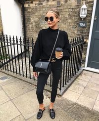 All-black outfit: black sweater, YSL black bag, Gucci black belt, black skinny pants, Gucci mules