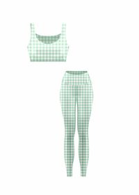 Introducing our Fancy Fit Collection!  Upgrade your workout wardrobe with our Brenlyn Barre Fit Set in Sage Green Gingham. This set includes a stylish sage green gingham sport bra and full length leggings, with a unique scrunch detail on the back of the sport bra. Look and feel your best during your next workout with t