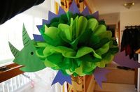 Dinosaur Pom-pon {image only, but this would be a neat addition in the dinosaur theme classroom!}