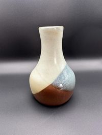 Beautiful Pottery Craft bud vase in excellent condition. Item is 5 7/8" tall and is ready for your flowers.