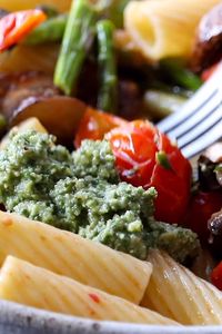 Farmer's Market Pasta! Vegan, summer veggie-loaded pasta with roasted garlic, olive oil, lemon juice, and a big dollop of herby walnut pesto. THE BEST. #summerrecipe #healthypasta #farmersmarket #pasta | pinchofyum.com