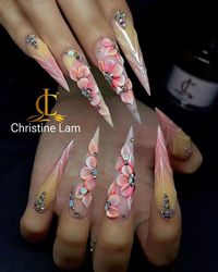 Lam Christine on Instagram: "Stepping into spring with these stunning nude stiletto nails, blooming with 3D flowers 🌸💅✨  Floral Fantasy - Stiletto Nails ✌️  #springnail #floralnail #nudevibes #acrylicnails #nailsdesign #nailsjunkie #nailsglam #nailsnailsnails #ombrenails #nailsart #sparklenails #nailsfashion ##nailsofinstagram #nailspromote #fashionnails #nailsoftheday #namenails #nails #instagramnails #beautynails #art #nailsinspire #nailsvideos #cllamsupply wasy #teamcllam #christine__lam"