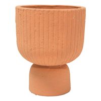 The Ribbed planter made from terracotta has a minimalist etching design to complement any interior styling. Add some floral and create an earthen atmosphere.