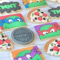 PLEASE MESSAGE ME FOR A CUSTOM LISTING IF YOU NEED A DATE FURTHER AWAY OR ARE WANTING A DIFFERENT QUANTITY! This listing includes 2 Dozen (24) Ninja Turtles Themed Decorated Sugar Cookies *8 Turtle Faces *6 Pizza Slices *4 TMNT logo *6 Sewer Lids We use quality ingredients, pay attention to detail and bake with LOVE! This you will see and taste.  Ingredients and Allergy Warning: Cookies: All-purpose flour, white sugar, salted butter, eggs, vanilla extract, almond extract, cornstarch. Icing: Powder sugar, Meringue powder, vanilla extract, corn syrup, vegetable glycerin, gel food coloring. Allergy warning: This product contains wheat, eggs, milk and soy. It also contains natural and artificial flavoring as well as colors.  Please be advised that the product is produced in a facility that use