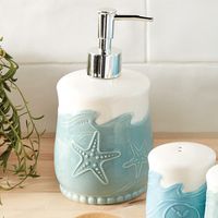 A Bella Coastal Decor Exclusive - Ceramic soap pump in sea inspired hues of blue and white. Hand wash. 3 9/10"Dia. x 7 1/10"H