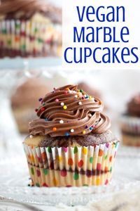 These fluffy vegan marble cupcakes are super rich and delicious, with swirls of chocolate and vanilla a simple vegan buttercream frosting! #vegancupcakes #veganmarblecupcakes #veganswirlcupcakes, veganvanillacupcakes #veganchocolatecupcake