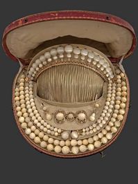 A French pearl parure from Napoleon's time, the comb alone as some thirty-eight pearls