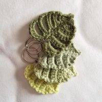 Handmade crochet monstera keychain♡ Perfect for any plant lover. The keychain is available in the 4 shades of green shown above. Dimensions are approximately 2.5" x 2.5", not including the keychain itself. Made with acrylic blend yarn which can be washed and dried flat. If you have any questions, please feel free to contact me! Shipping method is Canada Post letter mail shipping for domestic orders, and Canada Post Small Packet-Air for international orders. This method does NOT include tracking.