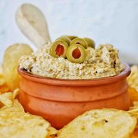 Green Olive Dip is a quick and easy recipe! This olive dip is perfect for entertaining and best served with crackers or chips!