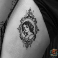 Revel in the grace of Victorian style with this sophisticated tattoo on the arm, depicting a noble lady within an ornate frame, ideal for vintage tattoo enthusiasts. Discover more at inktat2.com.