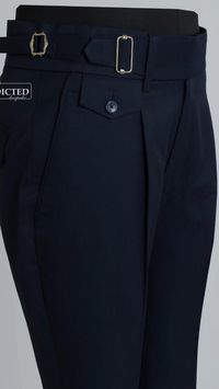 Elevate your formal attire with our bespoke Men's Blue Gurkha Pants. Meticulously crafted from premium cotton, these high-waisted trousers feature a slim fit, adjustable buckle closure, and a single pleat for a sophisticated look. Perfect for business and formal occasions, these pants exude style and confidence for him. - Custom Made - Straight Fit - High Waist Trouser - Adjustable Buckle On Waistband - Single Pleated - Side Slant Pocket - Flap Back Pocket - Soft Breathable And Lightweight