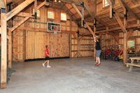 Basketball in the Barn! Post & Beam wood storage barn.  www.sandcreekpostandbeam.com https://www.facebook.com/SandCreekPostandBeam