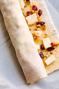 Cranberry Brie Puff Pastry Pinwheels – Sweet and buttery puff pastry rolled up with brie cheese, cranberries, nuts, and a drizzle of honey, and baked to perfectly flaky pinwheels.