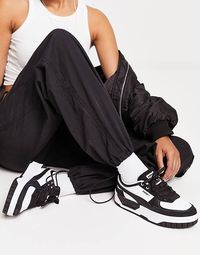 Puma Cali Dream trainers in white and black | ASOS