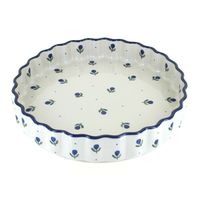 Great for a torte or your favorite quiche! 9.5" diameter x 1.75" deep. The Art of Polish Pottery, as we know it today, started as local folk art centuries ago in the German province of Silesia. The first known pieces of “Bunzlauer” stoneware dating back to the 16th century were crafted by hand and decorated with a folk art stamping technique using potatoes. Original designs were inspired by the peacock feather using the colors of cobalt blue, sage green and ferrous red. These designs and colors