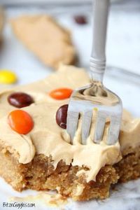 Peanut Butter Brownies - For the peanut butter lovers! Moist, cake-like peanut butter brownies topped with light and fluffy peanut butter frosting!