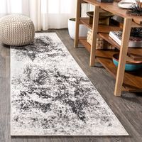 Mingled threads of charcoal and ivory create the effect of a modern, abstract black and white painting on your floor. This unique rug's busy pattern makes it perfect for homes with kids and pets. It's the perfect centerpiece for a mid-century modern, contemporary, or even a minimalist interior. Size: 2 x 8. Color: cream/gray. Pattern: Camouflage.