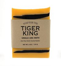 Pandemic Line: A Soap for TIGER KING  Details Handmade vegan soap bar designed by our in-house soap artisans with fragrance blends to match our corresponding candle. Shrink-wrapped with a kraft brown label. Soap size: 3 1/2" H x 2 3/4" W x 1" D.