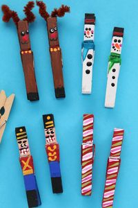 These painted clothespin Christmas ornaments are easy to make with just wooden clothespins and paint. They clip right to your Christmas tree, an evergreen garland or a string of Christmas lights. Make our reindeer, snowmen, candy canes and nutcrackers, or use your imagination to come up some creative ideas of your own. #HappyHooligans #HomemadeOrnament #Christmas #Craft #Kids #Art #Clothespin #Snowman #Reindeer #CandyCane #NutCracker Crafts #Tweens #Teens