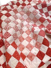 "Strawberry Cream Quilt Pattern, an all time favourite made in red and white quilt fabrics! The finished size is 55\" by 80\" (140cm x 204cm). That equals a large size single bed or a twin size bed quilt depending on your location.  A fabric border could be added to make the quilt larger if required. *THIS IS A DIGITAL print-at-home PDF SEWING PATTERN* Quilt will cover a single or twin bed, the bed in the photos is a large 6ft (180cm) wide bed.  Instructions are for machine sewing. Fabric Requir