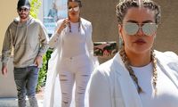 Khloe Kardashian wears a in tight white outfit as she films KUWTK with Scott Disick