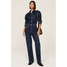 Blue denim (99% Cotton, 1% Lycra). Jumpsuit. Long sleeves. Collar. 55" from shoulder to hemline. 31" inseam. 11" rise. 16" leg opening. Imported. Fitted Straight Leg Cotton Denim Jumpsuit, Relaxed Fit Button-up Denim Jumpsuit For Fall, Fitted Cotton Denim Jumpsuit With Straight Leg, Relaxed Fit Long Sleeve Denim Jumpsuit, Dark Wash Straight Leg Overalls For Work, Fall Button-up Medium Wash Denim Jumpsuit, Fitted Medium Wash Denim Jumpsuit For Work, Fitted Denim Overalls For Workwear, Relaxed Fit Jeans Overall For Work