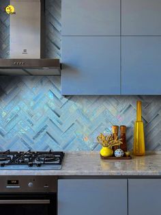 a stove top oven sitting inside of a kitchen next to a microwave and countertop